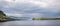 A view of Staffin island and Staffin harbour. Garrafad bay and An Corran Beach.  fishing boat and cottage