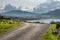 A view of Staffin island and Staffin harbour. Garrafad bay and An Corran Beach.  Seaweed on the beach.  A road along the bay