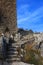 View of the staircase carved in stone and the remains of the tower of the fortress of Kritinia