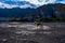 View of standing Anatolian shepherd with the background of a rocky mountain