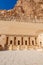 View of the statue,  hieroglyph, relief and broken column at Amun Court in Mortuary Temple of Hatshepsut