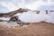 View of steam emitting from fumarole in geothermal area of Hverir against sky