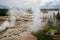 View of the steaming geysers and thermal features in Norris Geyser Basin boardwalks