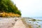 View of the steep coast at Gollwitzer Strand. Natural beach near Gollwitz in the nature reserve on the island of Poel