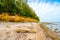 View of the steep coast at Gollwitzer Strand. Natural beach near Gollwitz in the nature reserve on the island of Poel