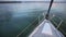 View from the stem of yacht. Walking on water. Close up