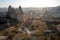 View of stone formations in Cappadocia valley.