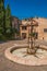 View of stone houses in a narrow alley under blue sky at Les Arcs-sur-Argens at Les Arcs-sur-Argens