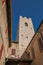 View of stone steeple tower next to church in Vence.