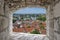 View from stone window of city center in Vilnius, Lithuania.  View from above of St. Stanislaus Cathedral on Cathedral Square,