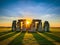 View of Stonehenge from under the golden sunlight