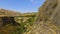 View of stony basalt rocks and deep gorge, Armenia landscape, ecotourism