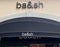 View on store facade with logo lettering of ba and sh fashion label