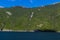 A view of streams on wooded sides of the Chilkoot Inlet close to Skagway, Alaska