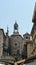 View of the street with city clock building and stone houses in old town, beautiful architecture, sunny day, Split, Dalmatia,