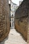 View of the street between the two walls in the Jewish quarter of Girona, Spain.