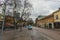 View of street of Uppsala, Sweden. Sky with thunderclouds in winter day.Red buildings on sky background. Tourism,