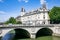 View of the streets of Paris with a bridge over the River Seine