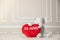 View of a stuffed elephant holding a heart with Te Amo writing on it - valentine\'s concept