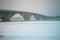 View of the subway bridge and Dnieper river in dense fog, misty landscape, Kyiv the capital of Ukraine, Eastern Europe