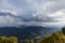 View at the summit of Mor La Ah Mountain with the rain falling far away. Located in the Karen District of KNU