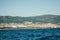 View of Sunny Beach from the sea with floating boat, Bulgaria.