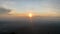 the view of the sunrise seen from the top of a high mountain