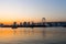 View of sunset and boats and rainbow bridge at sumida river suns