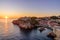 View of sunset with Fort Lovrijenac and Dubrovnik West Harbour in Croatia