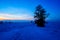 View of a sunset over a winterly landscape