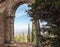 View on surroundings from castle-monastery of Escornalbou throw the arch, Tarragona, Spain