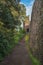 View of surviving walls and tower of Rougemont Castle