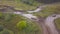 View of SUVs riding on puddle. Clip. Top view of surmounting puddles of SUVs on mud races. Jeep racing