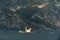 View on Sv.Djordje (left) and Gospa od Skrpjela ( right) alo known as Church Our Lady of the rocks in the morning. Perast, Monte