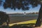 View of the Swan River and Perth skyline and coastline as seen from a pedestrian and bike track next to the city CBD