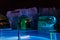 view of swimming pool with various colorful beautiful lights and cozy warm grotto