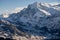 View of the Swiss mountains in winter. Mittelhornin clouds, Schreckhorn and Wetterhorn. Swiss alps in Switzerland Jungfrauregion