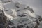 View of the Swiss mountains in winter. Mittelhornin clouds, Schreckhorn and Wetterhorn. Swiss alps in Switzerland Jungfrauregion