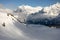 View of the Swiss mountains in winter. Mittelhornin clouds, Schreckhorn and Wetterhorn. Swiss alps in Switzerland Jungfrauregion