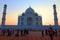 View of the Taj Mahal at sunrise is an ivory-white marble mausoleum