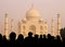 View Of Taj Mahal With Tourist Silhouettes