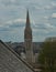View on tall bell tower of an Catholic cathedral in Caen, France from fortress