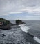 View of Tanah Lot from above in the afternoon. Bali, Indonesia.