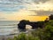 View of Tanah Lot, traditional balinese temple at sunset