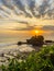 View of Tanah Lot, traditional balinese temple at sunset