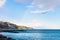 View of Taormina cape and rainbow in Ionian Sea