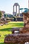 View on the Temple of Castor and Pollux through the ancient remains and ruins in Roman Forum in Rome
