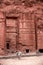 View of the Temples carved into the sandstone rock in the gorge. Petra, Jordan.