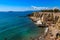 View of the terrace Giovanni Bovio and the lighthouse of Rocchetta in Piombino, Tuscany, Italy, in the background Elba Island