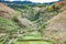 view of terraced hills and creek in Dazhai village